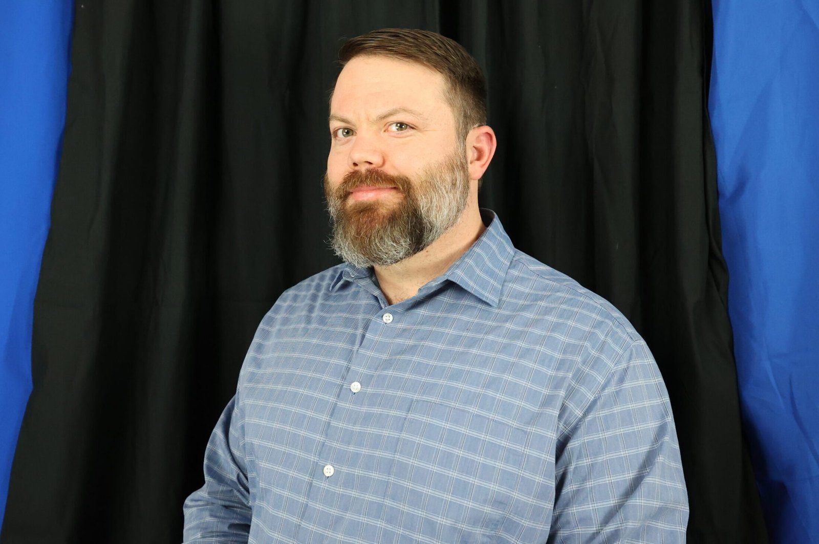 A headshot of OrangeGremlins founder Rob Fischer